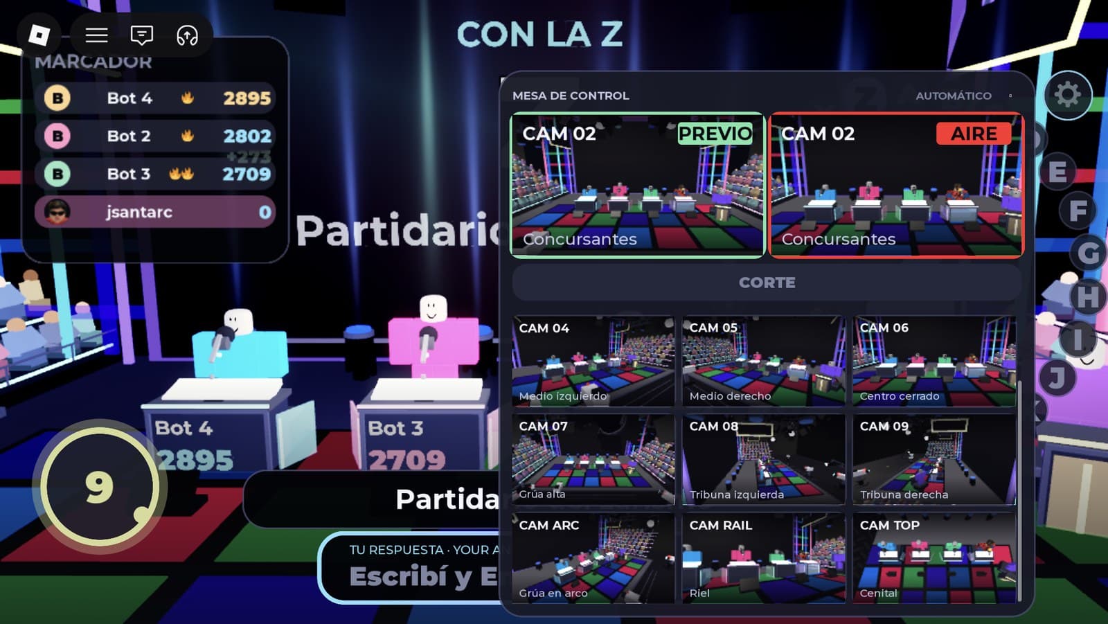 The host’s switcher panel with a preview and air monitor pair, a cut button and nine camera monitors over a live question